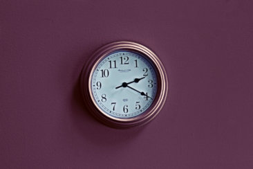 round brown analog wall clock