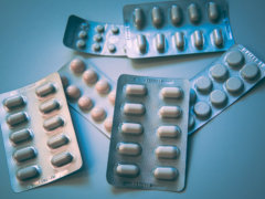 white and blue medication pill blister pack