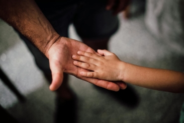 Father and Child's Hands Together